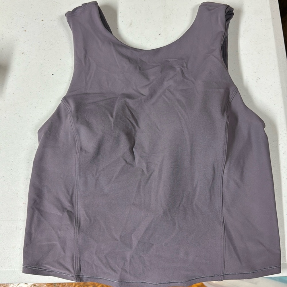 Lululemon tank with padded shelf bra.Size 6.Purple.Tag cut out for comfort